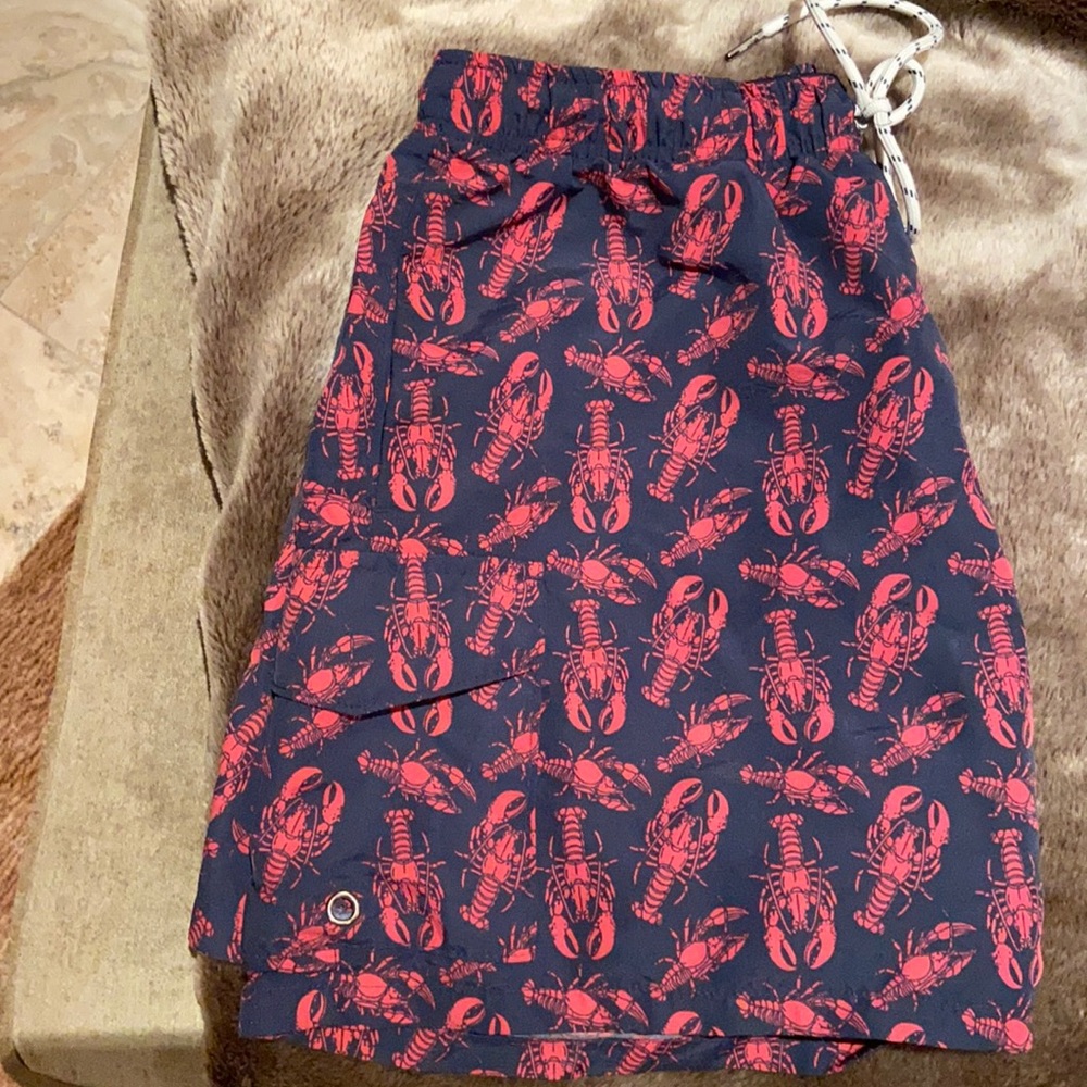 Men’s Sz small bathing suit.  Black w/red lobsters